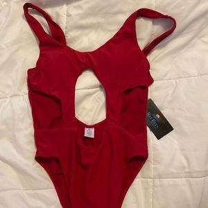 Monikini size medium , new with tag, never worn, red swimsuit